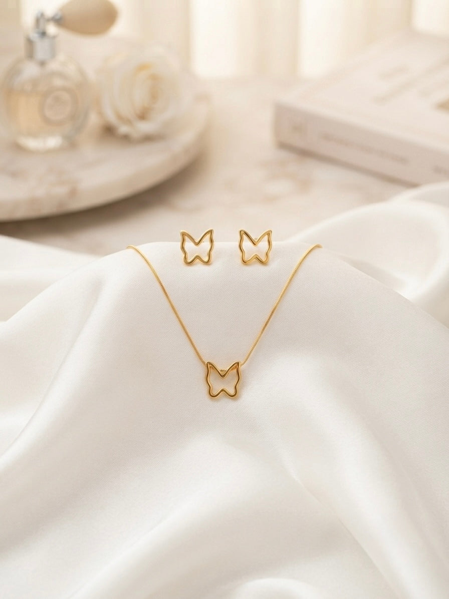 Minimalist hollow butterfly pendant and earring set.