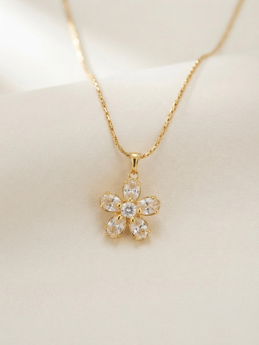 Sparkling gold crystal flower pendant necklace.