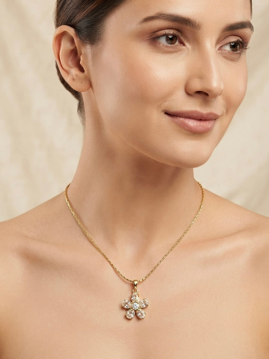 Sparkling gold crystal flower pendant necklace.