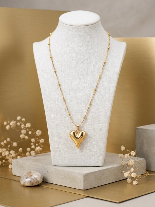 Gold satellite chain puffy heart pendant necklace.