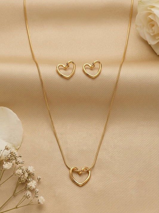 Minimalist hollow gold heart necklace and studs.