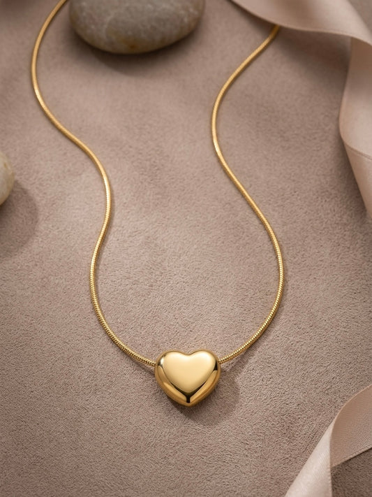 Polished gold puffy heart pendant chain necklace.