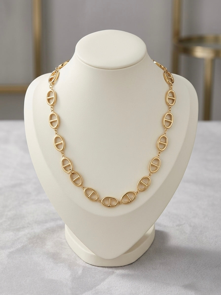 Modern gold puffed link statement necklace.
