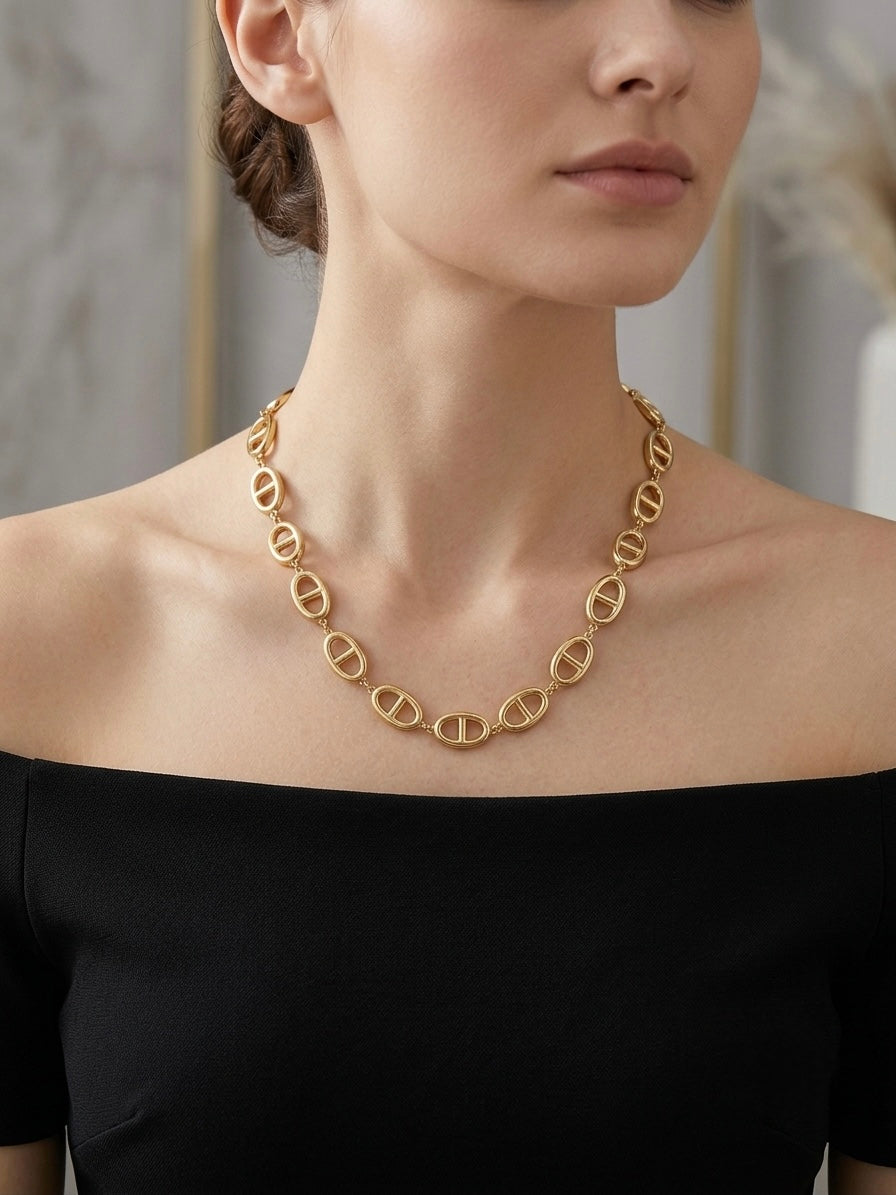 Modern gold puffed link statement necklace.