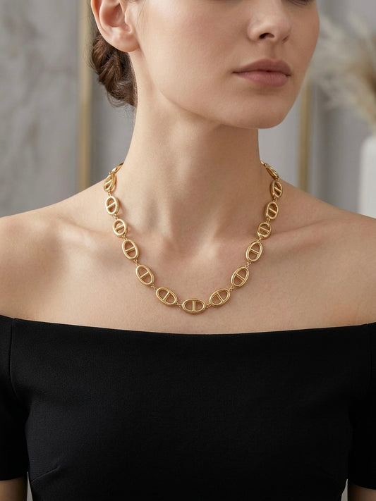 Modern gold puffed link statement necklace.