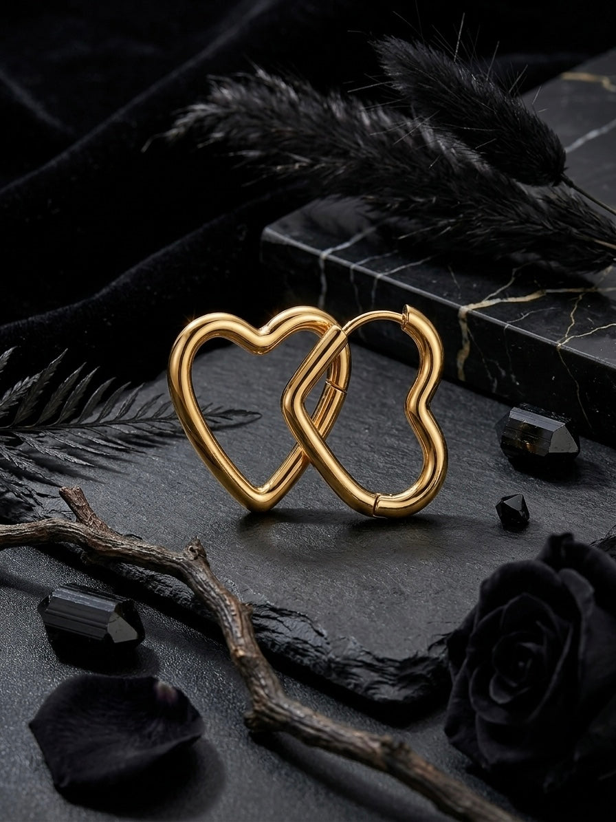 Romantic gold open heart hoop earrings.