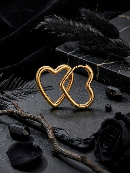Romantic gold open heart hoop earrings.