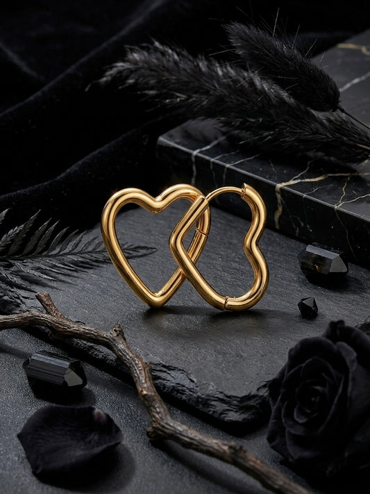 Romantic gold open heart hoop earrings.