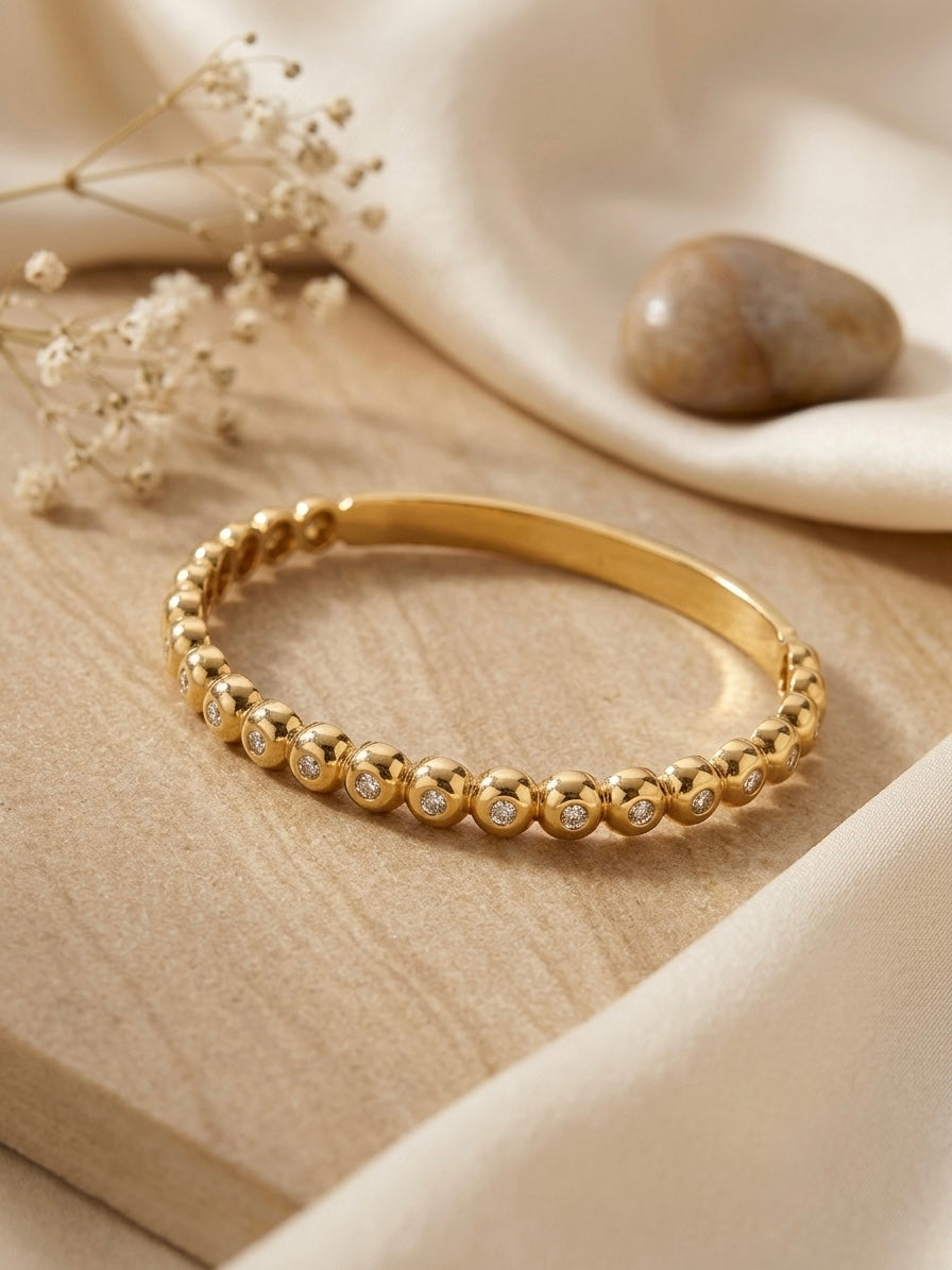 Chic gold ball studded stone bracelet.