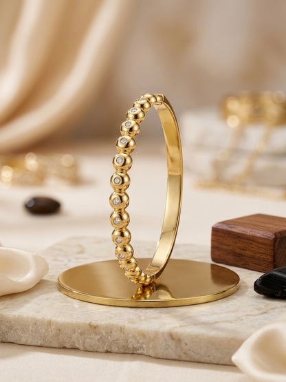 Chic gold ball studded stone bracelet.