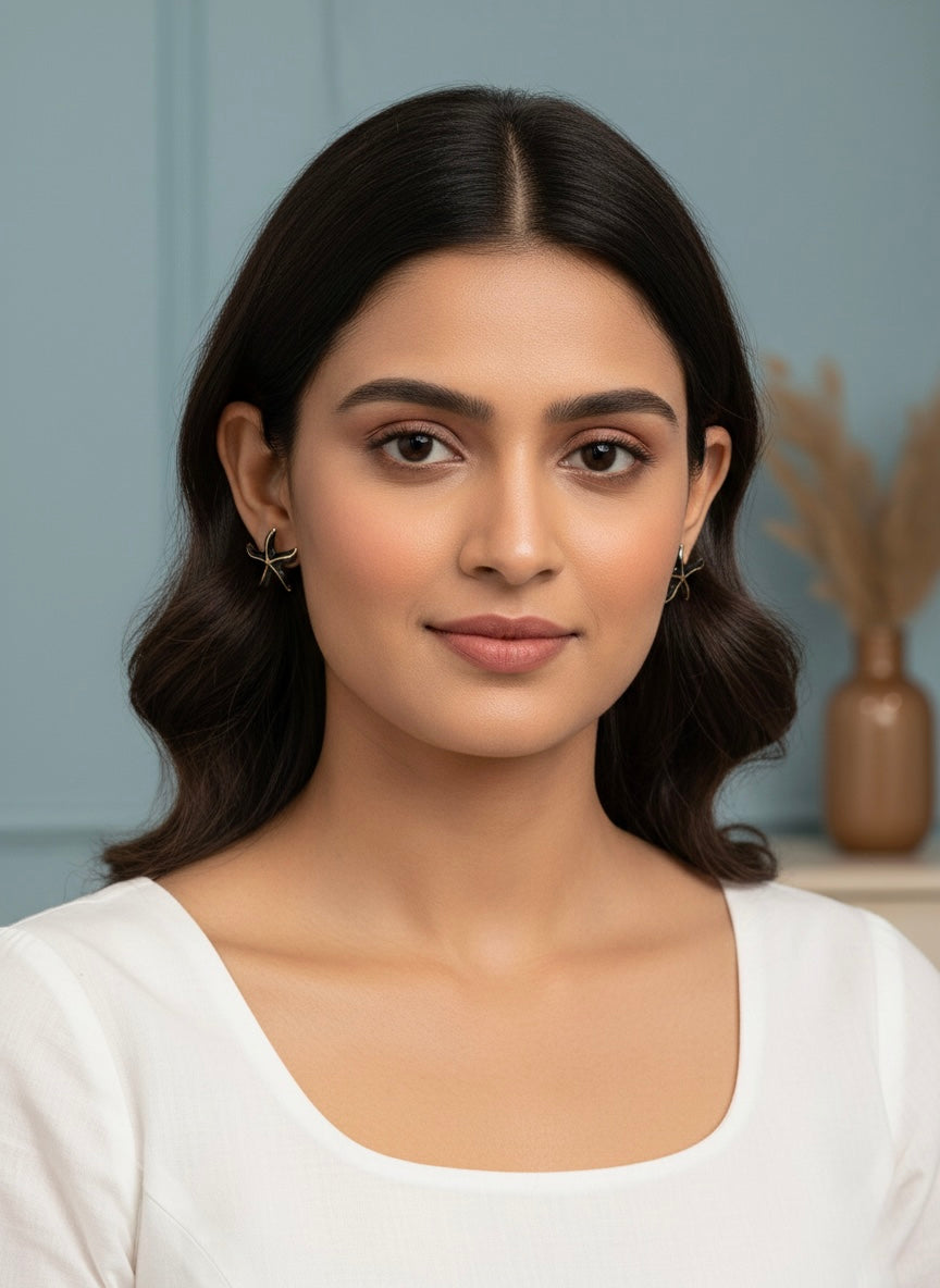 Minimal black starfish stud earrings