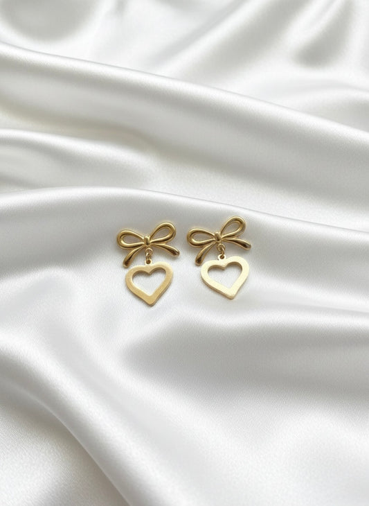 Gold bow heart drop earrings