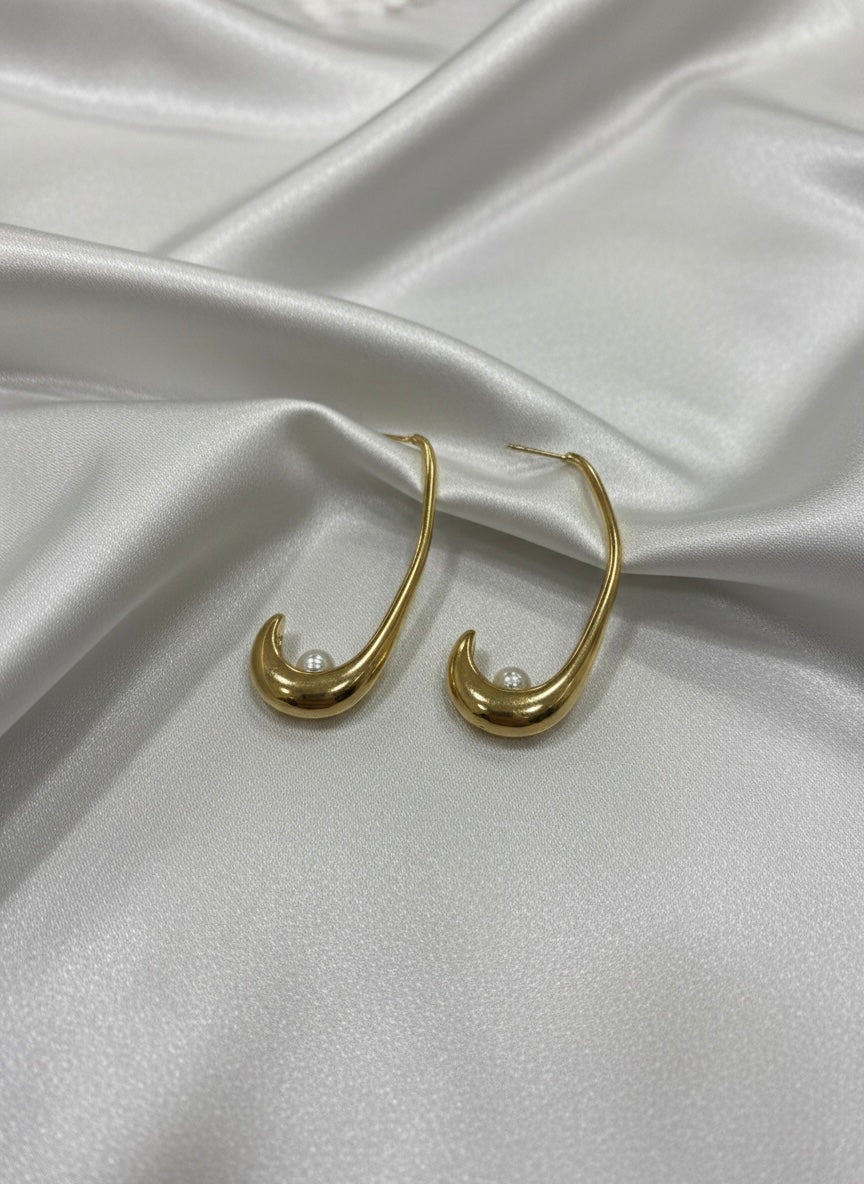 Modern gold crescent hoops with pearls