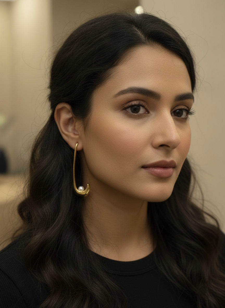 Modern gold crescent hoops with pearls