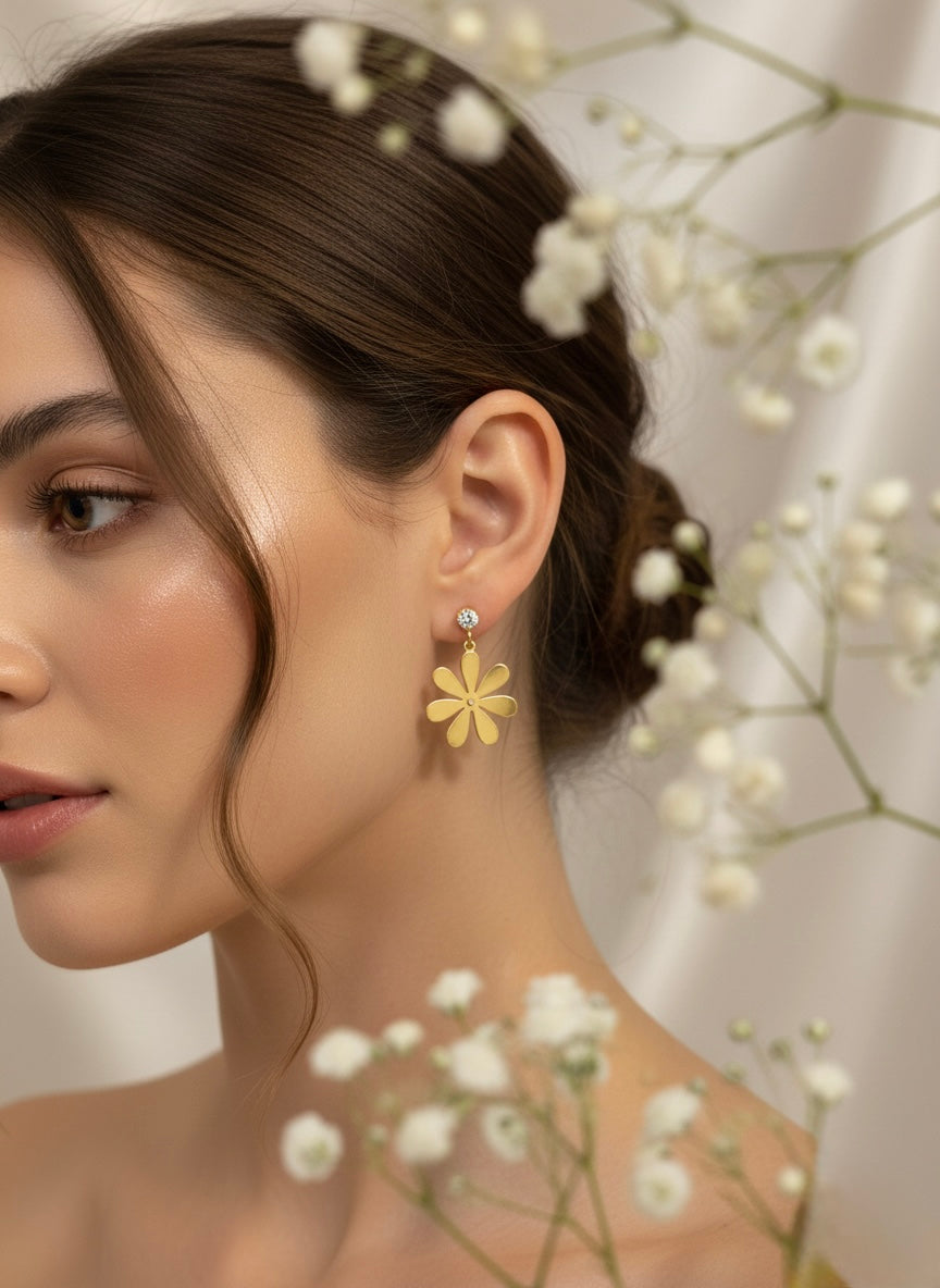 Gold solitaire flower drop earrings
