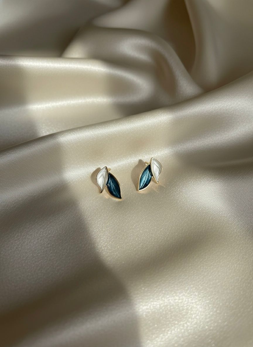 Two tone leaf stud earrings