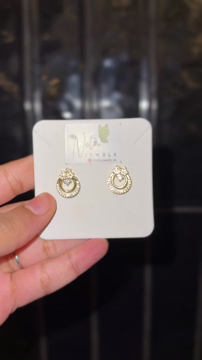 Radiant gold circle crystal stud earrings.