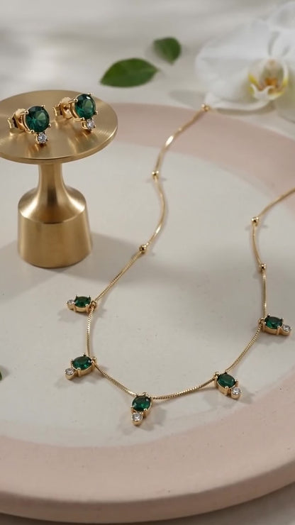 Delicate emerald stone necklace set.