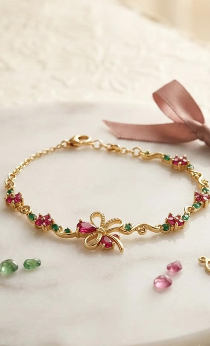 Charming floral bracelet, radiant gold finish.