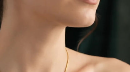 Minimalist gold  chain bead slide necklace.